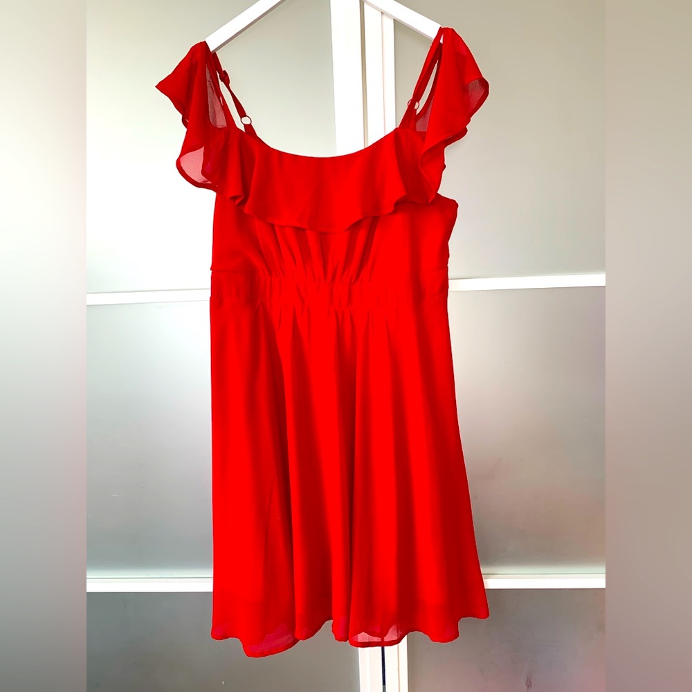 Red chiffon skater-style dress w/ adjustable straps and off-shoulder sleeves. 10